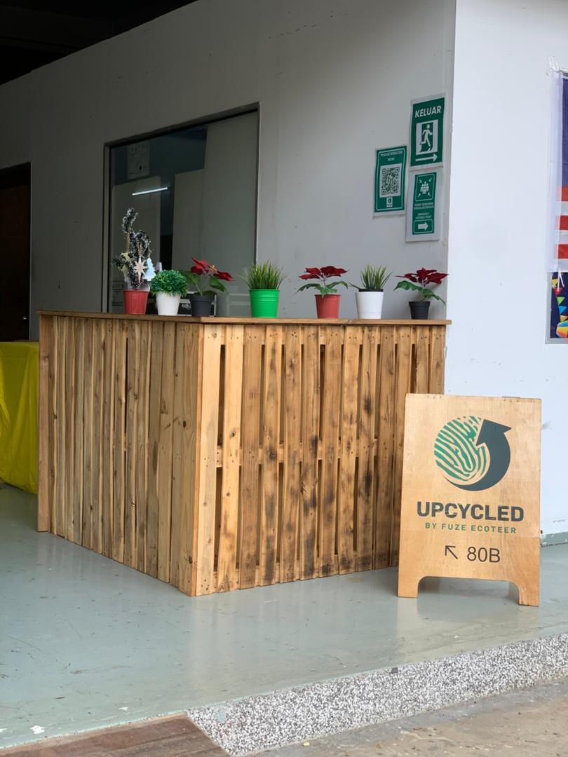 Upcycled wood event counter and signage
